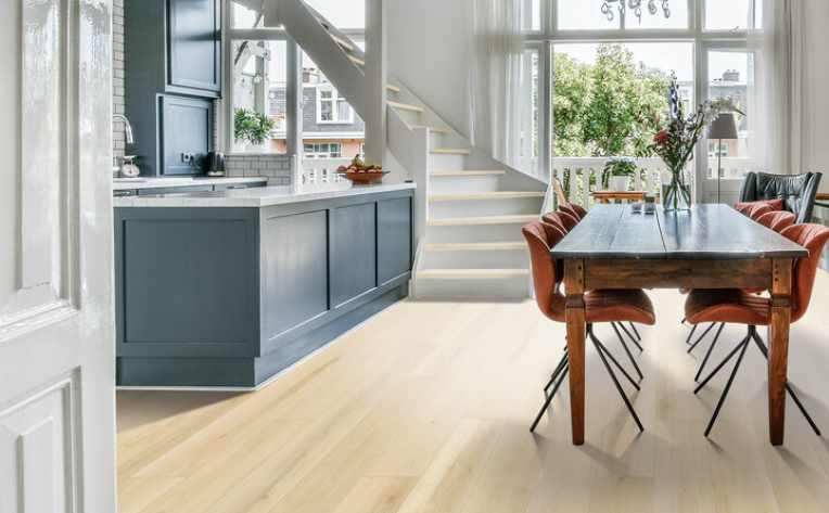 light white oak look luxury vinyl in modern kitchen with earth tones